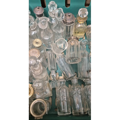 498 - A Large collection of Silver plated & glass topped bottles; Vinegar & salt jars with glass & metal l... 