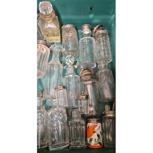 498 - A Large collection of Silver plated & glass topped bottles; Vinegar & salt jars with glass & metal l... 