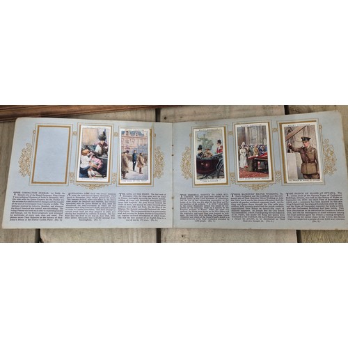 493 - A collection of Framed Wills cigarettes cards together with King George cigarette card Album