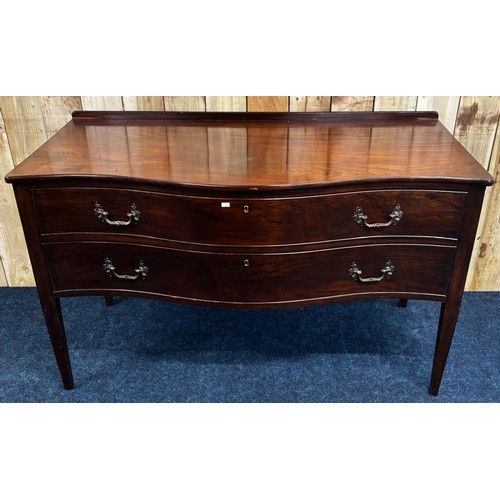 272 - 19th century Mahogany serpentine two drawer chest. Fitted with ornate bronze swing handles. Raised o... 