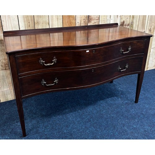 272 - 19th century Mahogany serpentine two drawer chest. Fitted with ornate bronze swing handles. Raised o... 