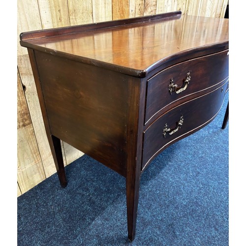 272 - 19th century Mahogany serpentine two drawer chest. Fitted with ornate bronze swing handles. Raised o... 