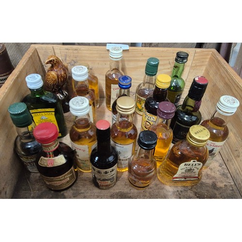 434 - A collection of Whisky & other miniatures & two gentlemans vintage travel sets ; Bells old scotch wh... 