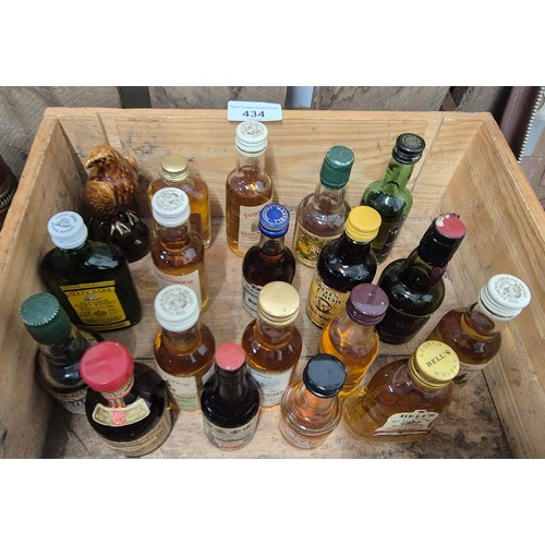 434 - A collection of Whisky & other miniatures & two gentlemans vintage travel sets ; Bells old scotch wh... 