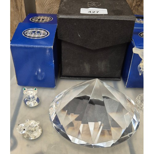 427 - A Tray of crystal animal figures with boxes & large crystal diamond shaped desk paperweight