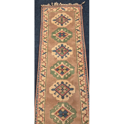 415 - A Turkish Hand Knotted Vintage Hall Runner. 334x83cm