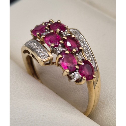13 - 9ct yellow gold, diamond and ruby stone ring. 2.68grams. Ring size M.