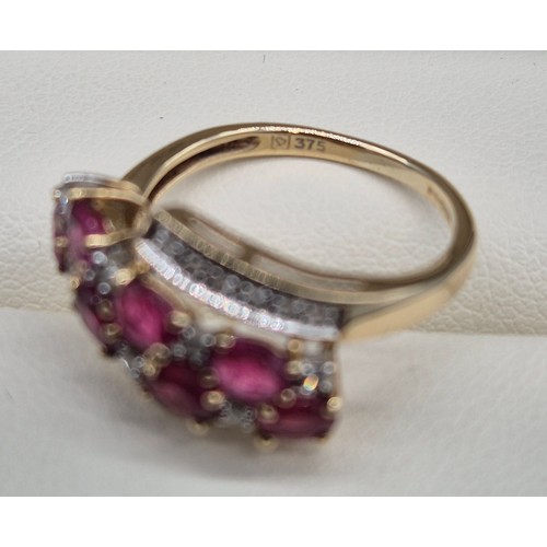 13 - 9ct yellow gold, diamond and ruby stone ring. 2.68grams. Ring size M.