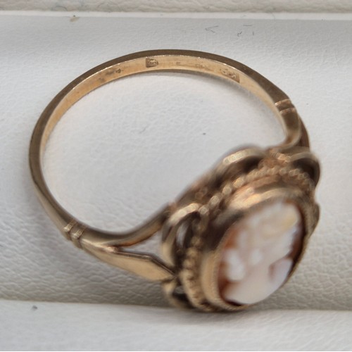 11 - 9ct yellow gold and carved cameo ring. Together with a 835 silver and purple stone ring. 2.60grams- ... 