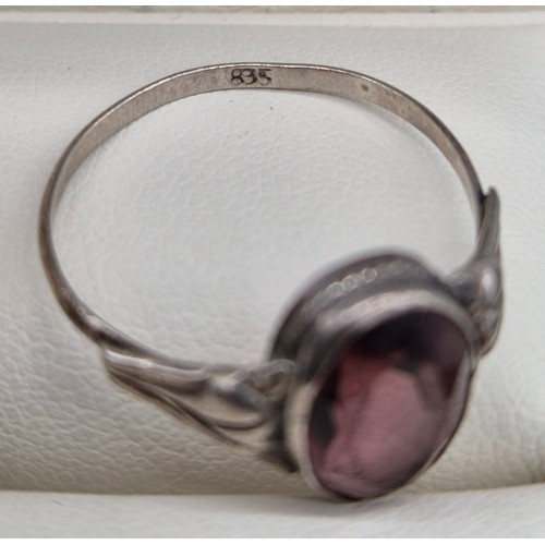 11 - 9ct yellow gold and carved cameo ring. Together with a 835 silver and purple stone ring. 2.60grams- ... 