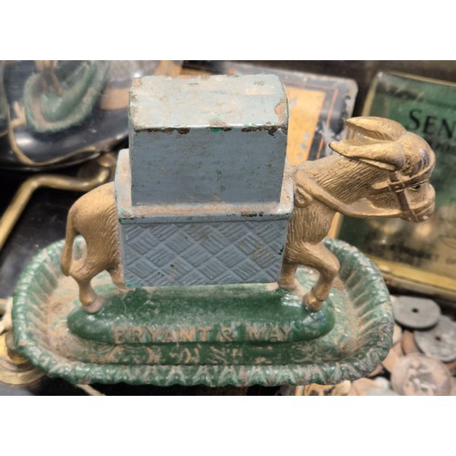 391 - A Collection of odds; Victorian cast iron donkey figure by Bryant & May, Metal and enamel elephant f... 