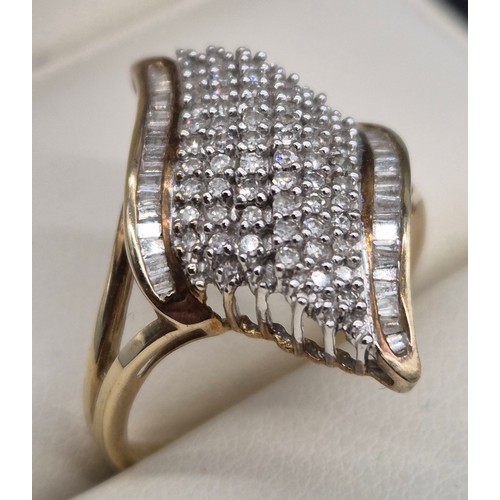 9 - 9ct yellow gold and diamond cluster ring. Fitted with six rows of round cut diamonds and two rows of... 