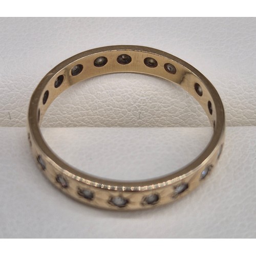 18 - 9ct yellow gold and diamond stone band ring. 2grams. Ring size N 1/2.