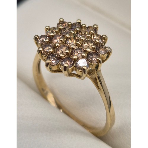 22 - 9ct yellow gold and diamond cluster ring. 0.90cts diamonds. 2.64Grams. Ring size P.