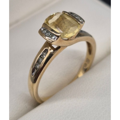 24 - 9ct yellow gold, Citrine and Diamond stone ring. 2.58grams. Ring size P. Having 12 round cut diamond... 
