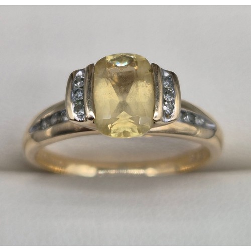 24 - 9ct yellow gold, Citrine and Diamond stone ring. 2.58grams. Ring size P. Having 12 round cut diamond... 