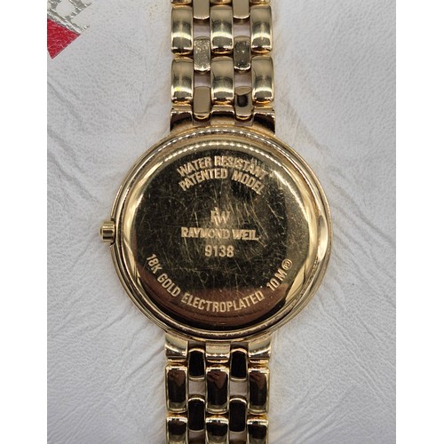 28 - Ladies Raymond Weil Geneve wristwatch. Serial number 9138. 18ct gold plated case and bracelet. Comes... 