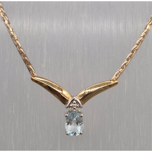 6 - 9ct yellow gold, diamond and blue topaz gem stone necklace. 5.60grams.