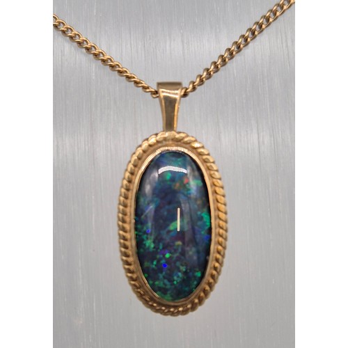 41 - 9ct yellow gold chain together with a 9ct yellow gold and fire opal gem stone pendant. 5.73grams