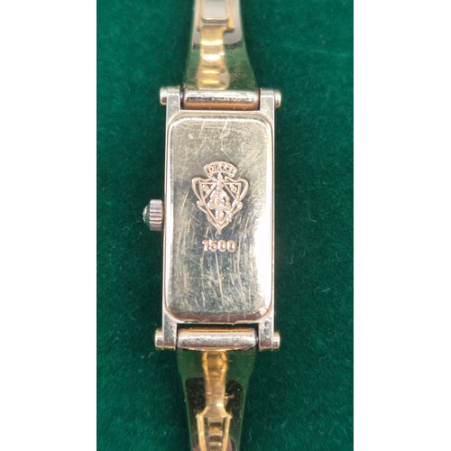 29 - Vintage 1996 Gucci 1500 ladies bangle watch. Mother of pearl dial. Gold plated. Comes with Gucci car... 