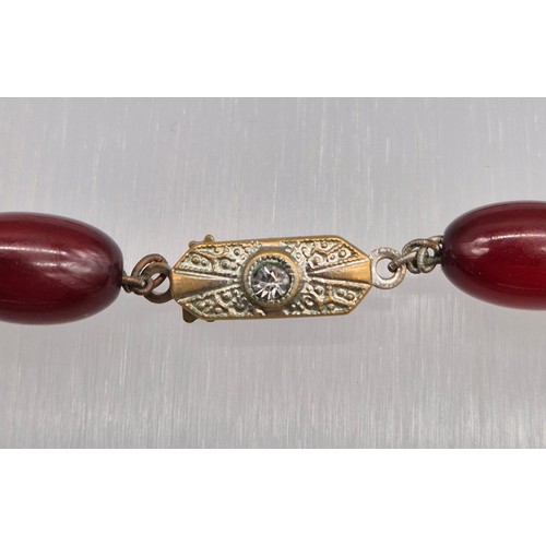 47 - Vintage Cherry Amber Graduating bead necklace. 49.79grams.