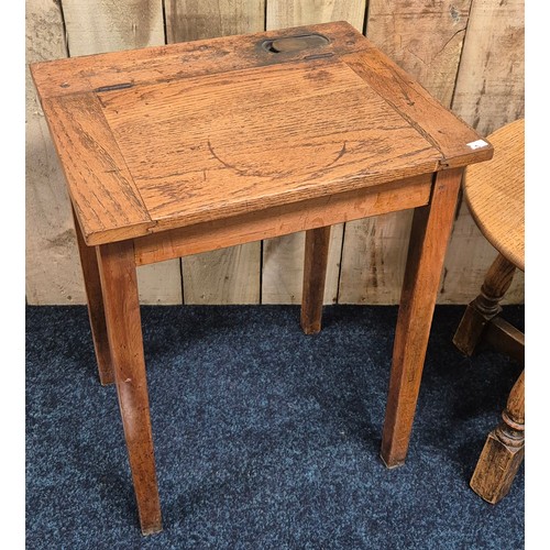 259 - Antique oak barrel top side table. Together with an oak school desk. Barrel top table- 47cm high.