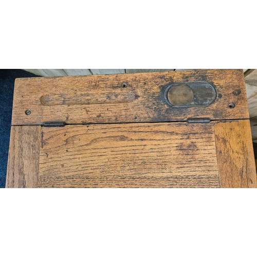 259 - Antique oak barrel top side table. Together with an oak school desk. Barrel top table- 47cm high.