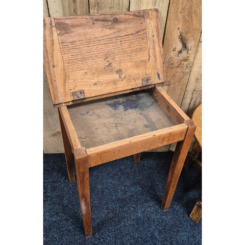 259 - Antique oak barrel top side table. Together with an oak school desk. Barrel top table- 47cm high.