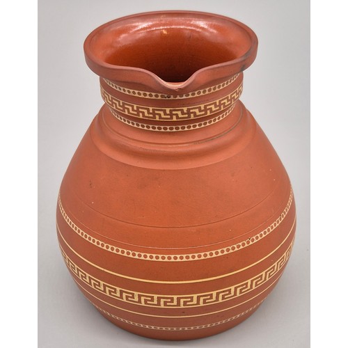 279 - 19th century Wedgwood terracotta water jug. Having a Greek key band design. 14.5cm high.