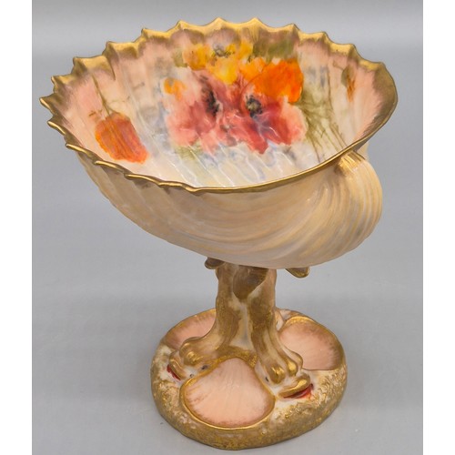 284 - Scottish Nautilus pottery shell design fruit bowl. raised with a stem made from porcelain fish and h... 