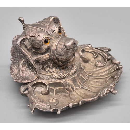 302 - 19th century silver plated dog head ink stand. Fitted with glass eyes. and has glass preserve presen... 