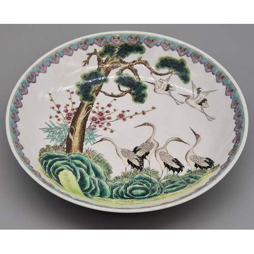 313 - Large Chinese Famille Rose wall charger. Designed with cranes. 36.5cm diameter. Stamp signature to t... 