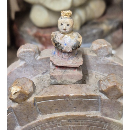 316 - Large antique Chinese soapstone temple carving. Raised on a wooden base. Buddha praying sat to the i... 