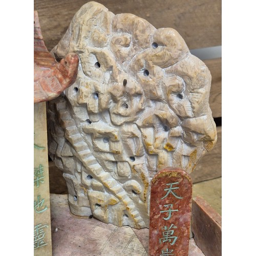 316 - Large antique Chinese soapstone temple carving. Raised on a wooden base. Buddha praying sat to the i... 