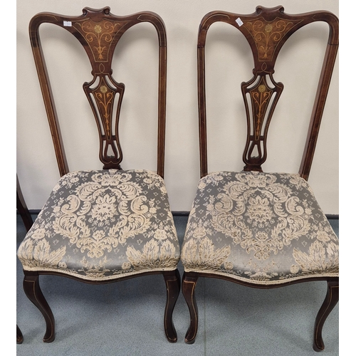 371 - A Set of Four Edwardian Inlaid Dining chairs. Raised on cabriole legs.