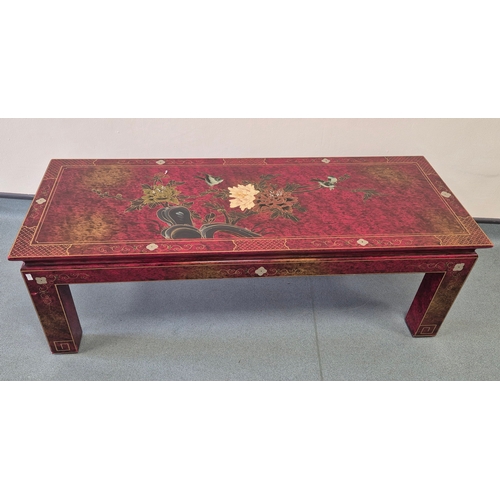 373 - Heavy Chinese Red lacquered coffee table. Designed with gilt hand painted trims and floral design. 4... 