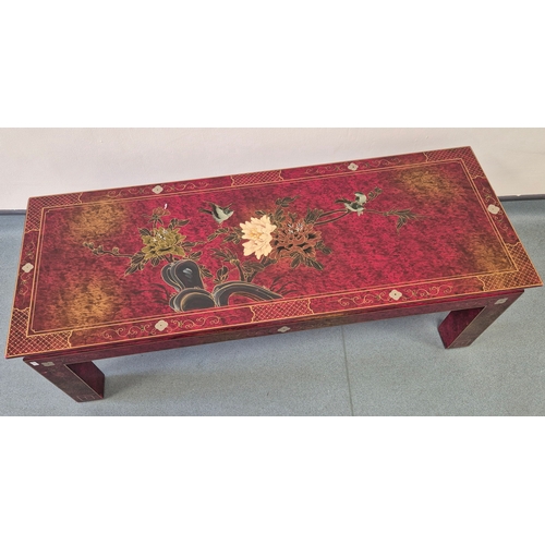 373 - Heavy Chinese Red lacquered coffee table. Designed with gilt hand painted trims and floral design. 4... 