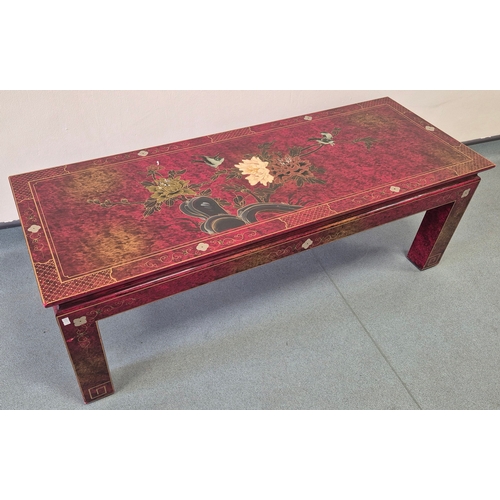 373 - Heavy Chinese Red lacquered coffee table. Designed with gilt hand painted trims and floral design. 4... 