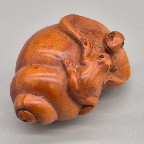 88 - Japanese hand carved boxwood netsuke sculpture of turtle within a shell and the frog resting on the ... 