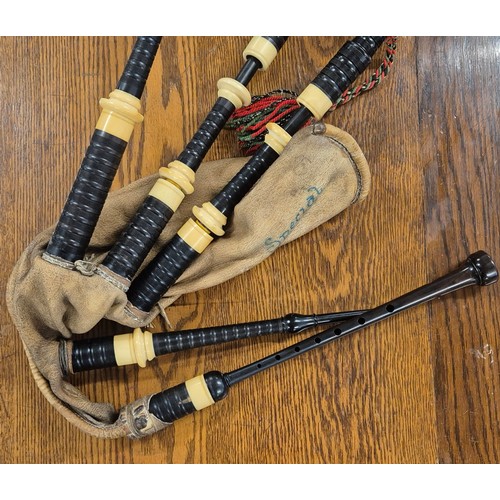 331 - Antique bagpipes by Jim. Tweedle of Inveran. Comes with carry case, Practice chanter and two other i... 