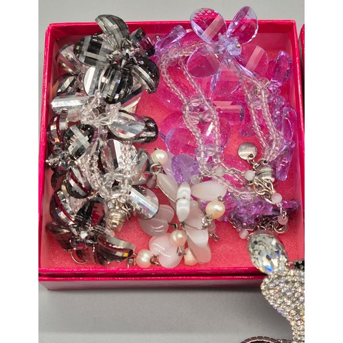 50A - A Selection of Butler & Wilson brooches and necklaces; Winged pendant and patching earrings. Chicken... 