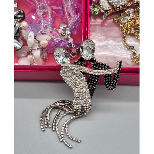 50A - A Selection of Butler & Wilson brooches and necklaces; Winged pendant and patching earrings. Chicken... 