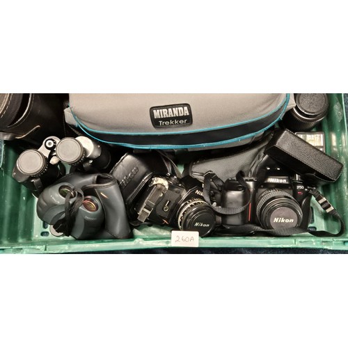 260A - Crate of cameras, lenses and Binoculars. Nikon F50 Camera. Samsung B 7X25N Binoculars and various ot... 