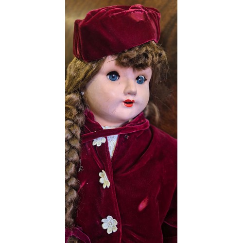655 - Large German Victorian doll with stand. Having a red velvet dress. Having movable limbs and eyes. 80... 