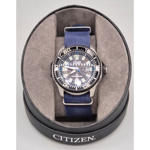Citizen Eco- Drive Divers 300M Wristwatch with original box and Instruction manual.