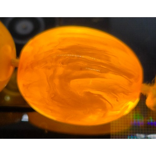 100 - Vintage Amber Egg Yolk Graduated Beads.