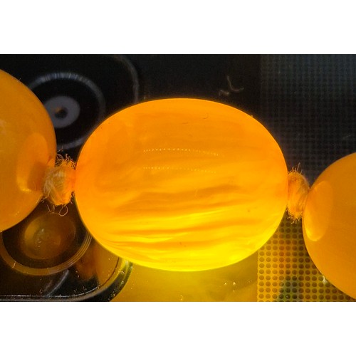100 - Vintage Amber Egg Yolk Graduated Beads.