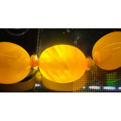100 - Vintage Amber Egg Yolk Graduated Beads.