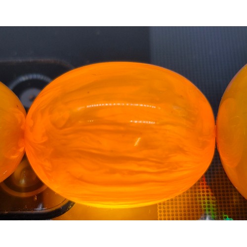 100 - Vintage Amber Egg Yolk Graduated Beads.