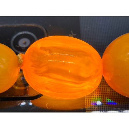 100 - Vintage Amber Egg Yolk Graduated Beads.